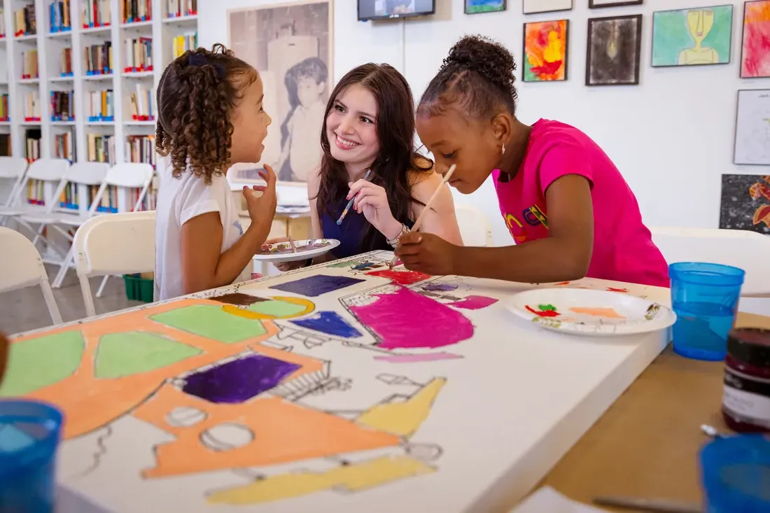 Student working with children at LaCasita.